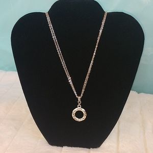 Silver tone ring pendant necklace